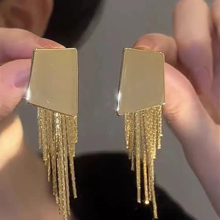 Boucles d’Oreilles Maxi Dorées Géométriques à Franges