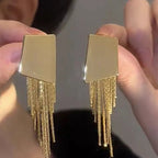 Boucles d’Oreilles Maxi Dorées Géométriques à Franges