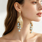 Boucles d’Oreilles Feuillage Doré aux Pierres Vertes