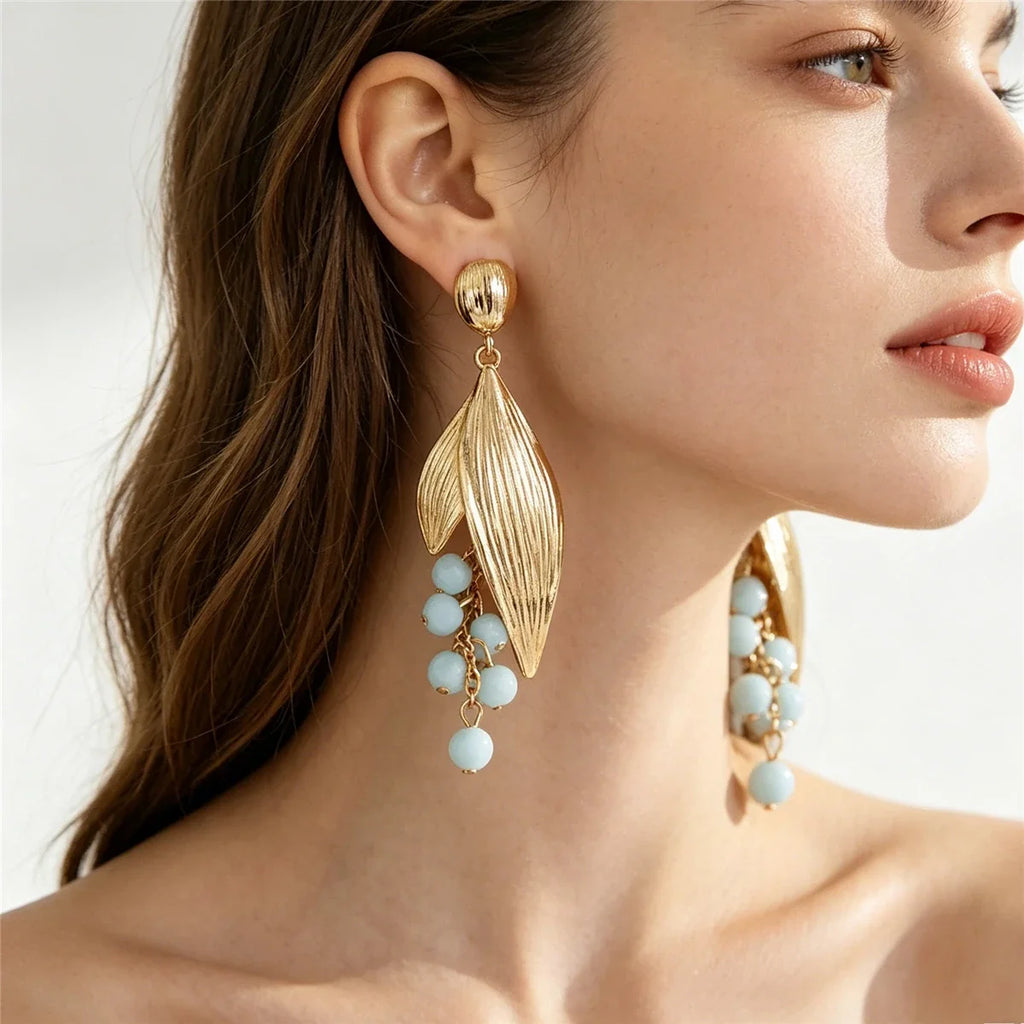 Boucles d’Oreilles Feuillage Doré aux Pierres Vertes