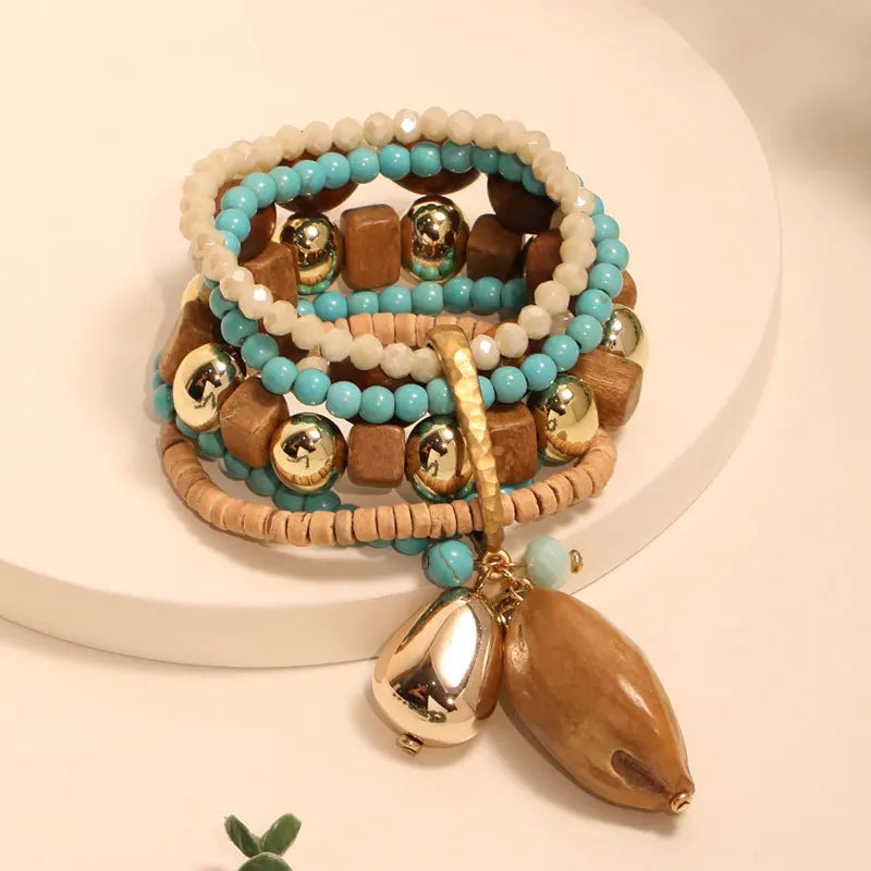 Bracelet multicolore à perles, bois et détails dorés, style bohème chic