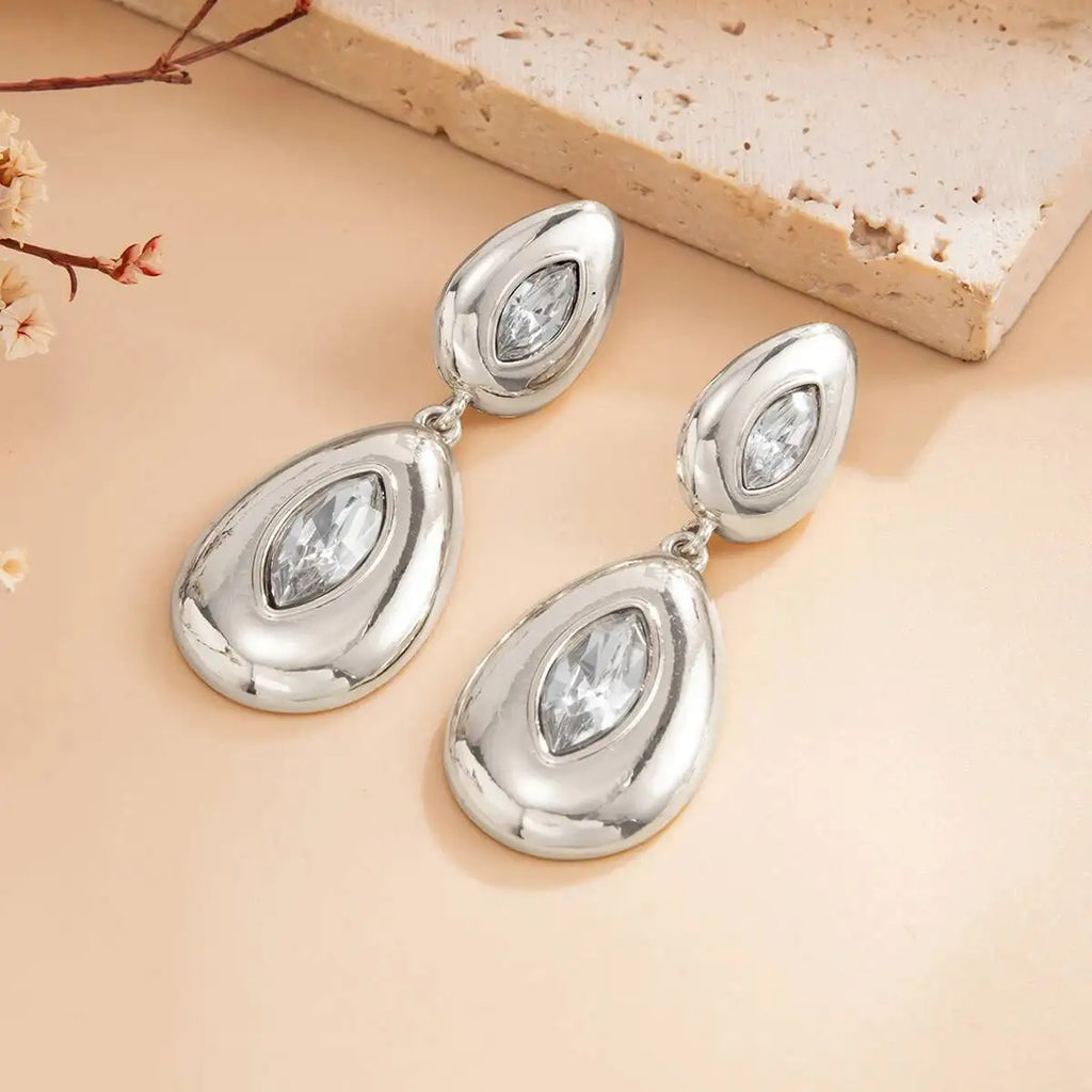 Boucles d’Oreilles Dorées aux Cristaux Taillés en Forme de Goutte