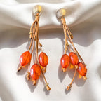 Boucles d’Oreilles Dorées aux Pierres Ambre et Fils Artisanaux