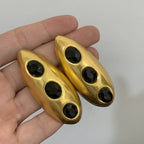 Boucles d’Oreilles Maxi Dorées aux Pierres Noires