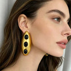 Boucles d’Oreilles Maxi Dorées aux Pierres Noires