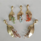 Boucles d’Oreilles Feuillage Doré aux Pierres Vertes