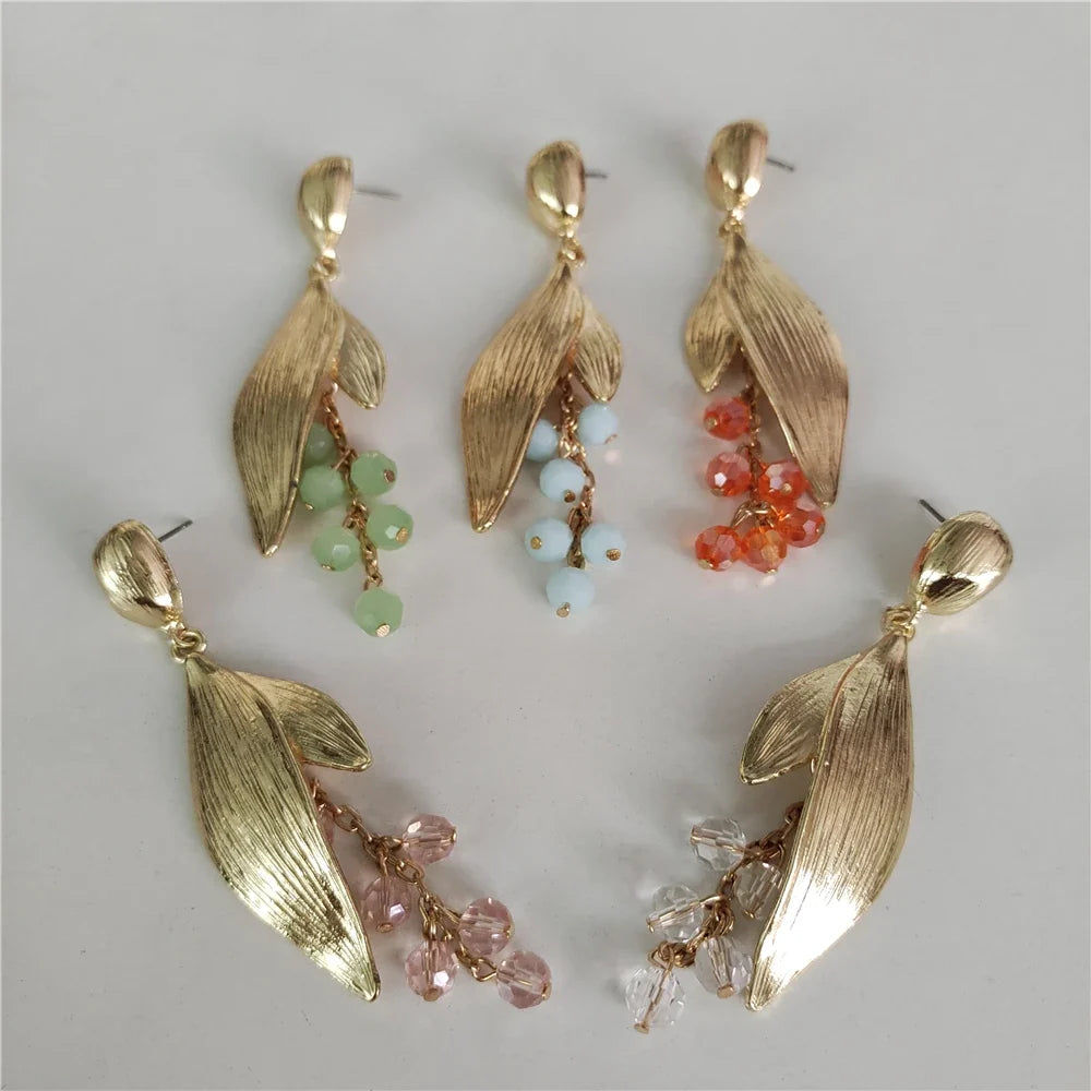 Boucles d’Oreilles Feuillage Doré aux Pierres Vertes