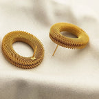 Boucles d’Oreilles Maxi Dorées à Chaînes Entrelacées