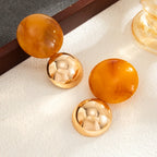 Boucles d’Oreilles Rondes Dorées en Résine Marbrée