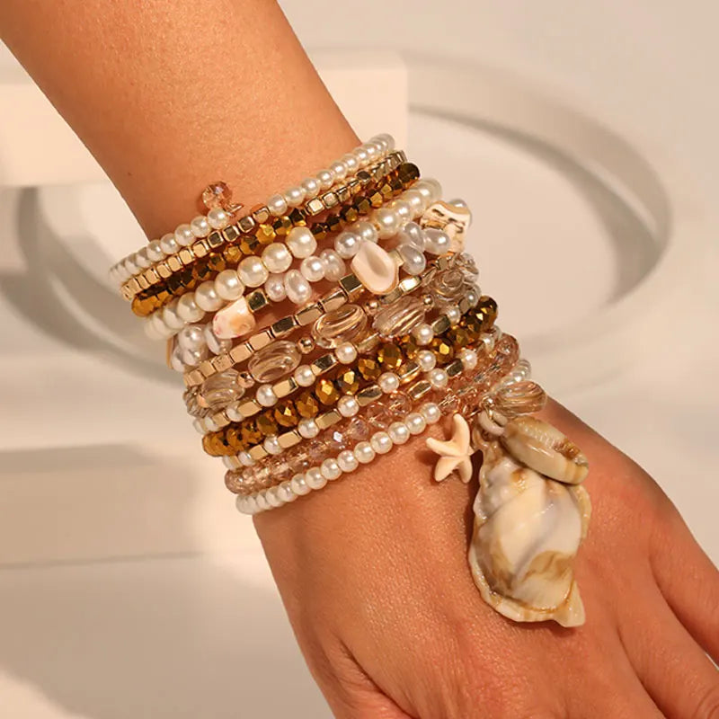 Ensemble de bracelets bohèmes dorés et perles avec coquillage