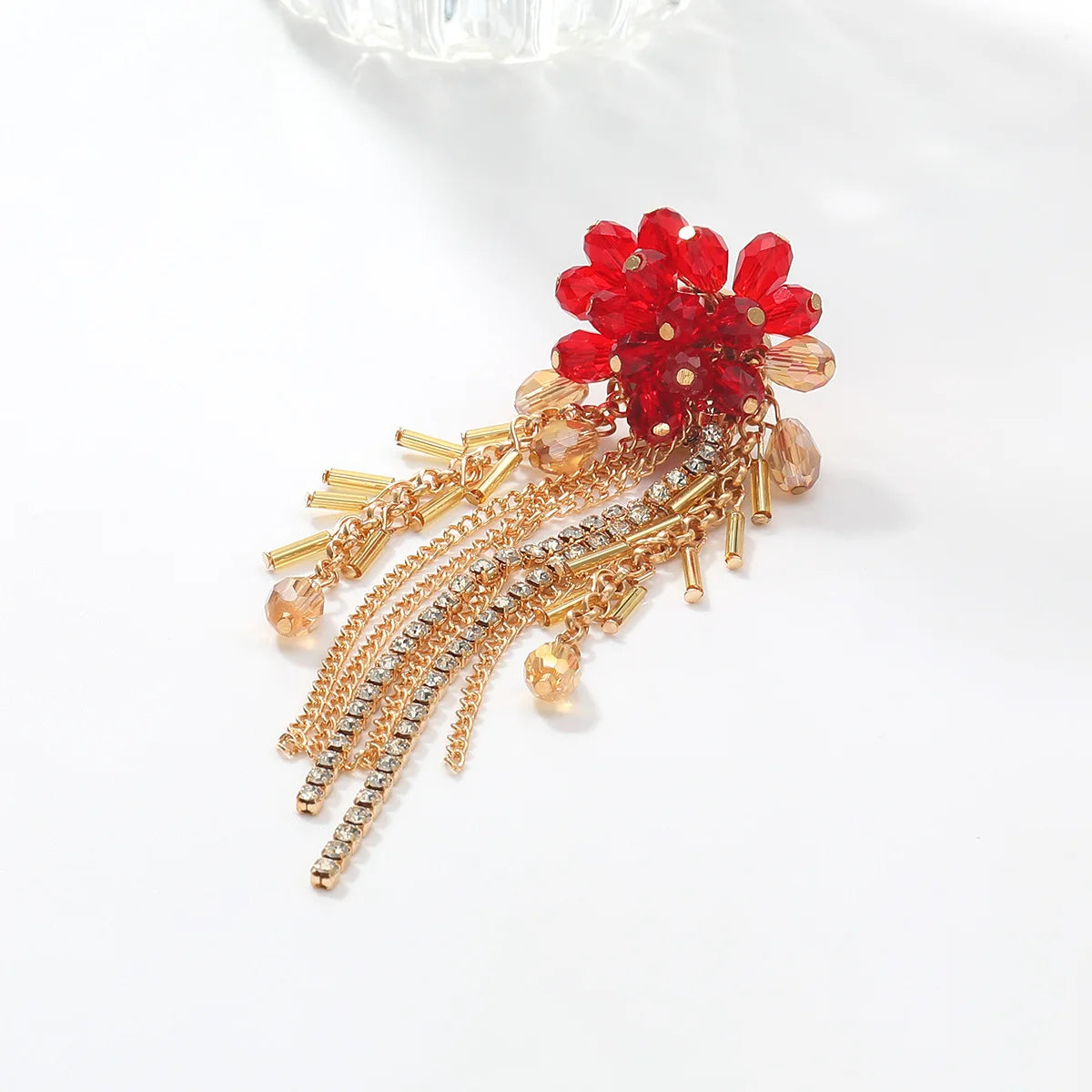 Boucles d’Oreilles Cascade Dorée aux Cristaux Bleus et Franges
