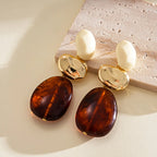 Boucles d’Oreilles Géométriques en Résine Couleur Ambre