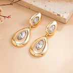 Boucles d’Oreilles Dorées aux Cristaux Taillés en Forme de Goutte