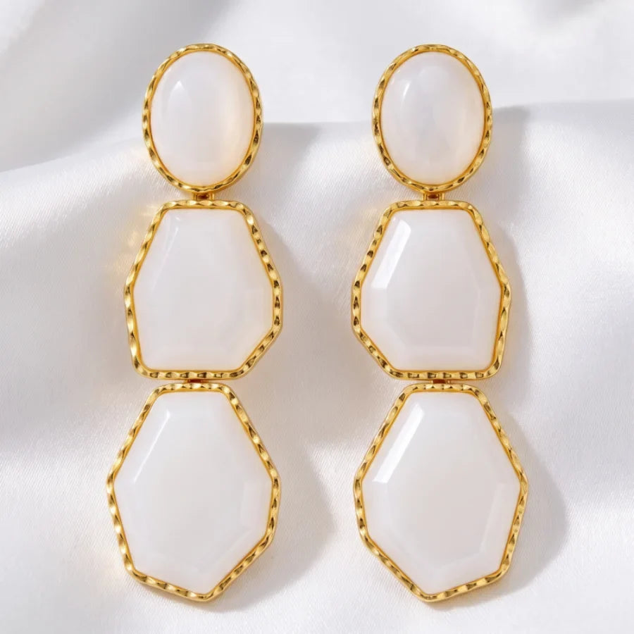 Boucles d’Oreilles Dorées en Résine Orange Géométrique