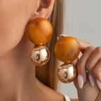 Boucles d’Oreilles Rondes Dorées en Résine Marbrée