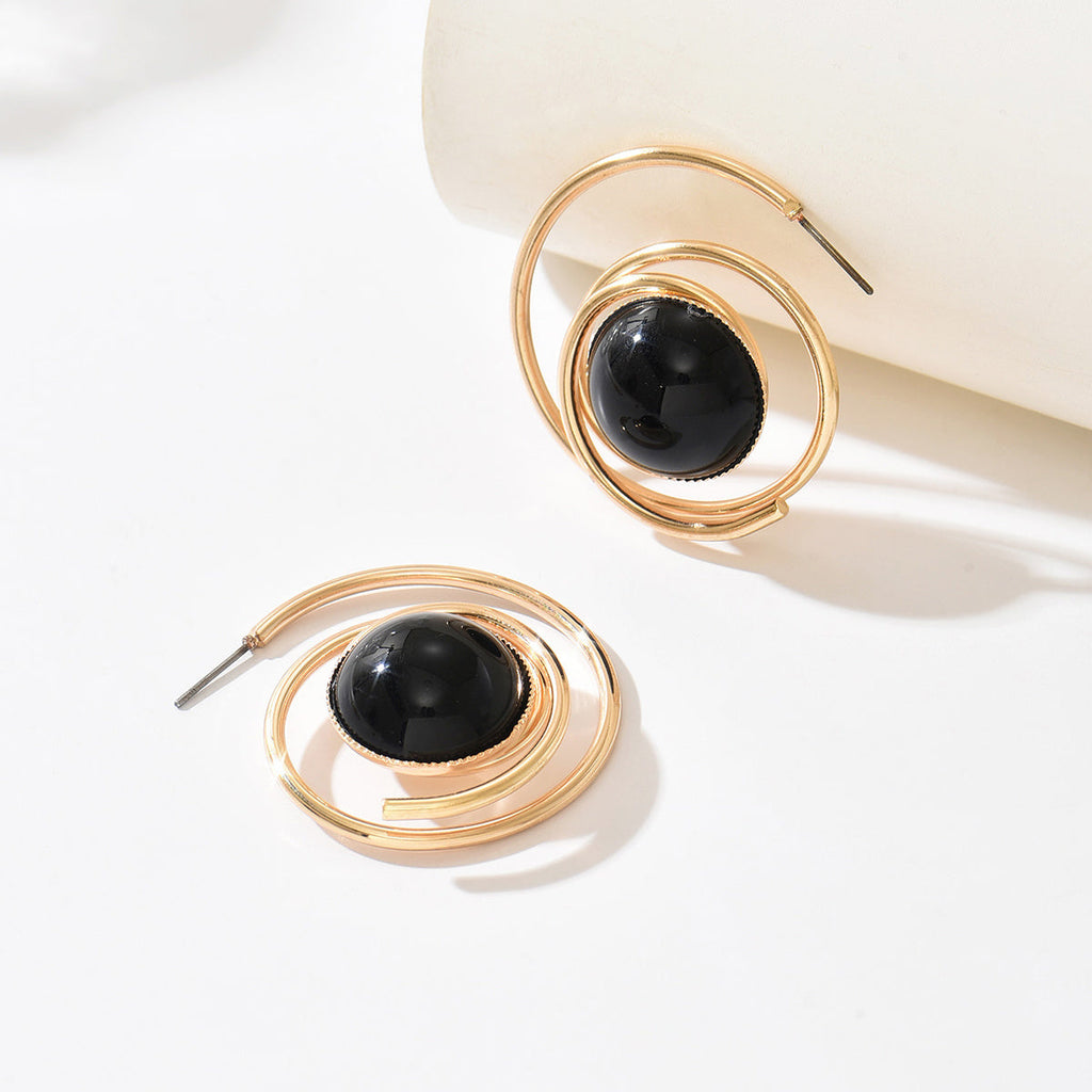 Boucles d'Oreilles Spirale Dorée et Pierre Noire