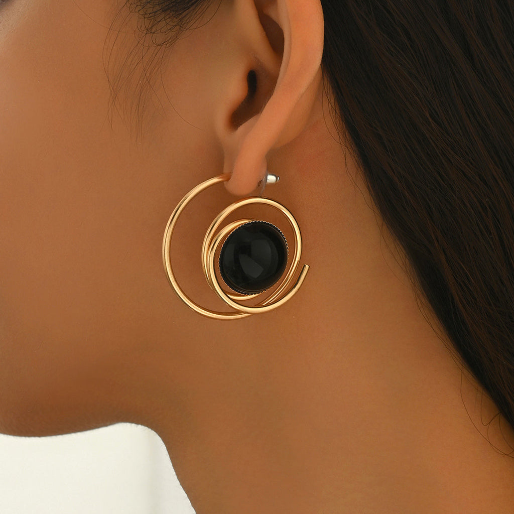 Boucles d'Oreilles Spirale Dorée et Pierre Noire
